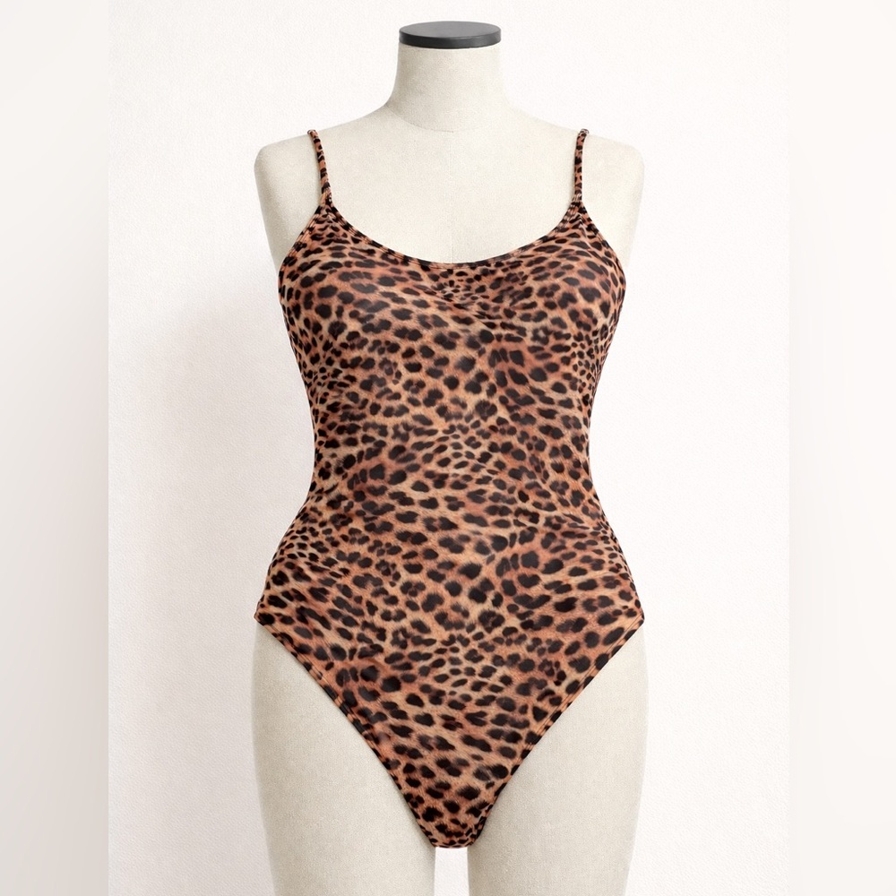 NWT Leopard Print one piece swimsuit. Size S padded, adjustable straps.